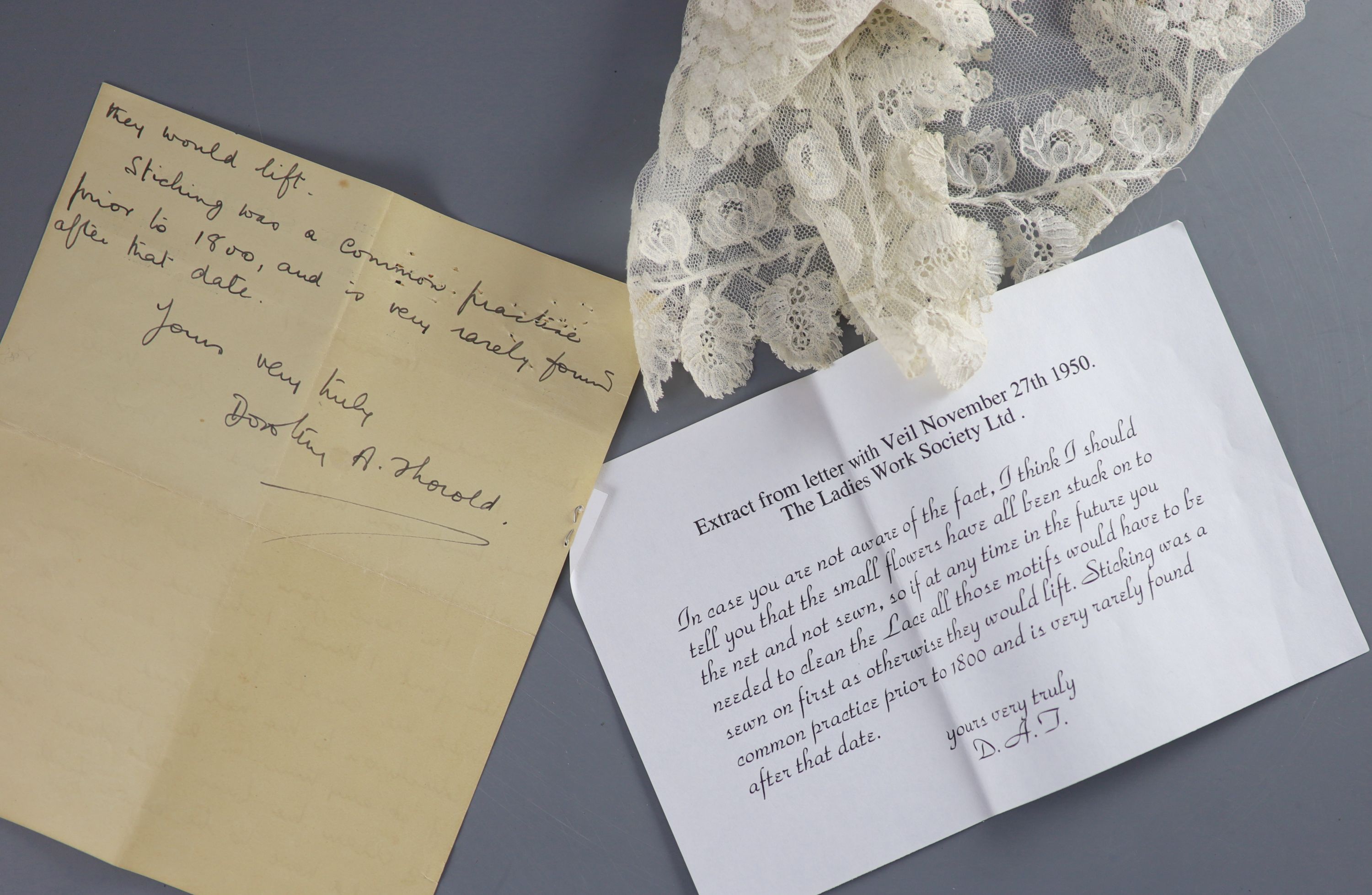 A fine 19th century bobbin lace Brussels christening veil, with letter of provenance and Ladies Society letter,